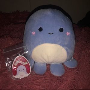 Squishmallow violet with pink hearts on cheeks